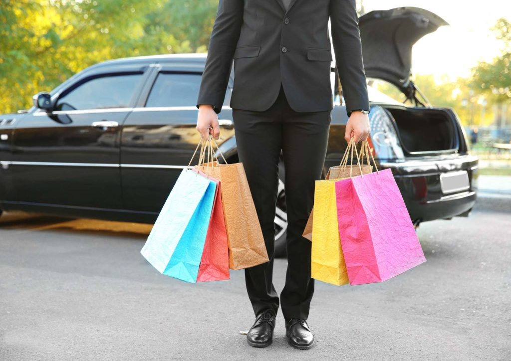 Private driver in Switzerland picking up a a passenger to go shopping